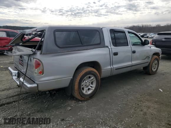 ✅ 2001 Dodge Dakota Sport • VIN: 1B7HL2AN71S275967 • Lot: 42954505. Wystawiony na Copart z przebiegiem 168 681 mil. Bezpłatny archiwum sprzedaży aukcyjnych z USA i szczegółowy raport historii pojazdu na DreamBid. Zdjęcie 3.