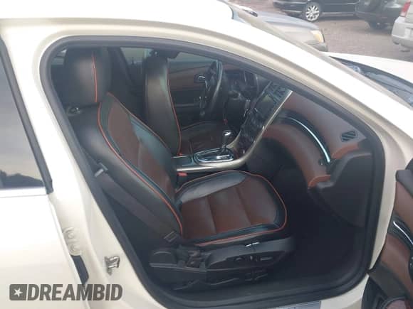 2013 Chevrolet Malibu LTZ with VIN 1G11J5SX5DF223834, listed as a IAAI auction lot 42792315 with 208,506 mi miles and . Bid and sale history available at DreamBid. Image 5.