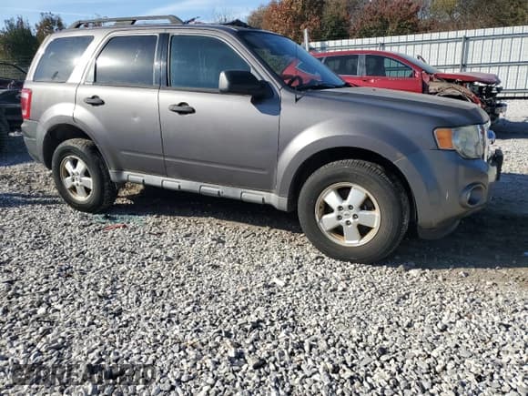 ✅ 2010 Ford Escape XLT • VIN: 1FMCU9D78AKA78766 • Lot: 85430135. Listed on Copart with 136,768 mi. Free auction sales archive from the USA and detailed vehicle history report at DreamBid. Image 4.