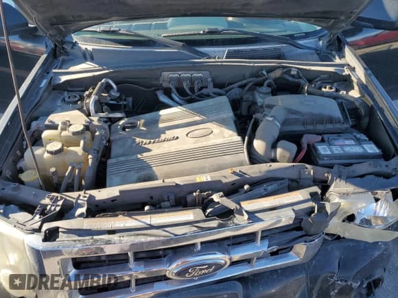 ✅ 2008 Ford Escape Hybrid • VIN: 1FMCU49HX8KA43144 • Лот: 86552095. Опубликован ранее на Copart с пробегом 310 960 миль. Бесплатный доступ к архиву аукционных продаж из США и подробный отчёт об истории автомобиля на DreamBid. Изображение 11.