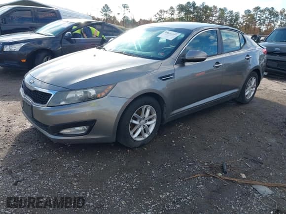 ✅ 2013 Kia Optima LX • VIN: 5XXGM4A74DG145536 • Lot: 43596515. Listed on IAAI with 166,793 mi. Free auction sales archive from the USA and detailed vehicle history report at DreamBid. Image 17.