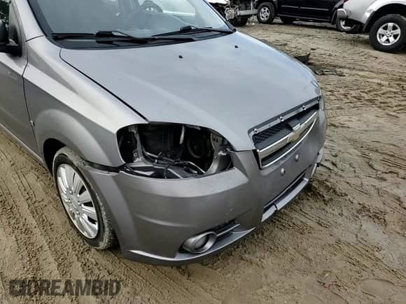 2009 Chevrolet Aveo 2LT z VIN KL1TG56E29B395364, wystawiony jako Copart lot #85162004 z przebiegiem 166 094 mil mil oraz Szkoda całkowita • Salvage title. Historia ofert i sprzedaży dostępna na DreamBid. Obrazek 11.