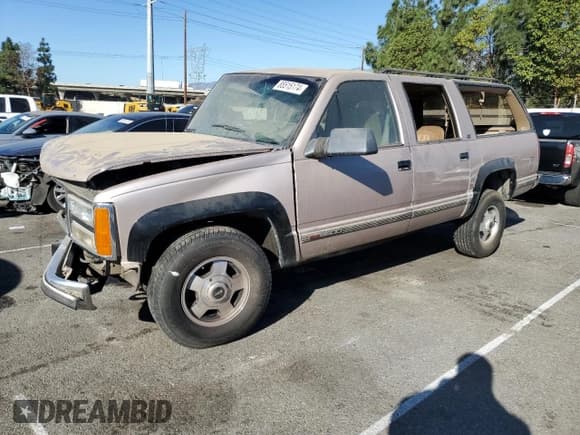 ✅ 1993 GMC Suburban • VIN: 1GKGK26NXPJ711771 • Lot: 85515174. Listed on Copart with 63,064 mi. Free auction sales archive from the USA and detailed vehicle history report at DreamBid. Image 1.