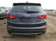 ✅ 2015 Hyundai Santa Fe • VIN: 5XYZTDLB2FG285774 • Лот: 69498402. Опубликован ранее на Copart с пробегом Не указан. Бесплатный доступ к архиву аукционных продаж из США и подробный отчёт об истории автомобиля на DreamBid. Изображение 6.