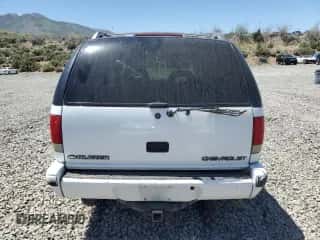 1997 Chevrolet Blazer LS z VIN 1GNDT13W2V2201660, wystawiony jako Copart lot #51158594 z przebiegiem 172 077 mil mil oraz Szkoda całkowita • Salvage title. Historia ofert i sprzedaży dostępna na DreamBid. Obrazek 6.