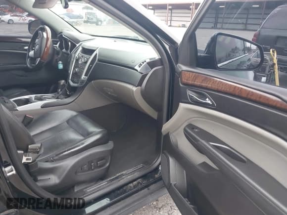 ✅ 2011 Cadillac SRX Premium Collection • VIN: 3GYFNCEY0BS611048 • Lot: 43379880. Listed on IAAI with 157,029 mi. Free auction sales archive from the USA and detailed vehicle history report at DreamBid. Image 5.