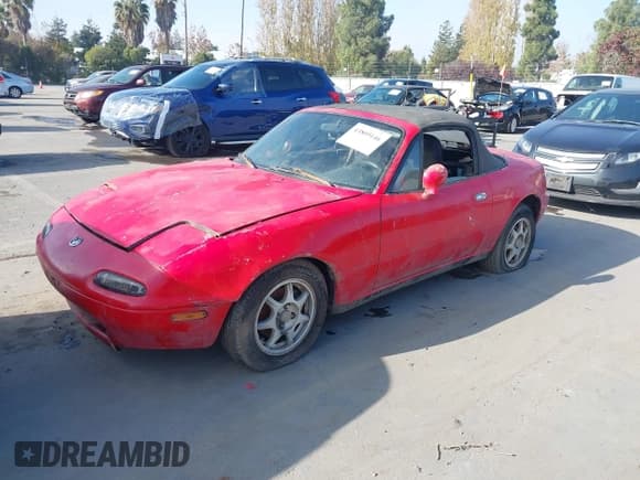 ✅ 1994 Mazda MX-5 Miata • VIN: JM1NA3533R0513473 • Лот: 43805146. Опубликован ранее на IAAI с пробегом 177 680 миль. Бесплатный доступ к архиву аукционных продаж из США и подробный отчёт об истории автомобиля на DreamBid. Изображение 2.