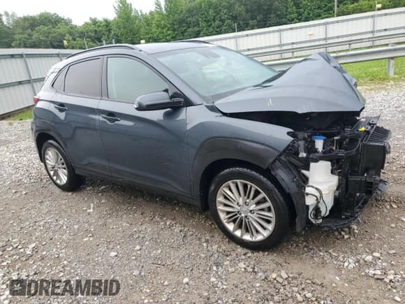 ✅ 2021 Hyundai Kona SEL • VIN: KM8K22AA7MU706642 • Лот: 64498245. Опубликован ранее на Copart с пробегом 99 999 миль. Бесплатный доступ к архиву аукционных продаж из США и подробный отчёт об истории автомобиля на DreamBid. Изображение 4.