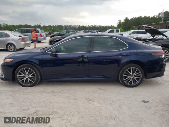 2022 Toyota Camry Hybrid XLE with VIN 4T1F31AK4NU591517, listed as a IAAI auction lot 42216959 with 36,048 mi miles and . Bid and sale history available at DreamBid. Image 14.