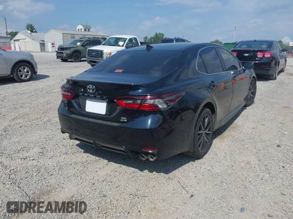 2022 Toyota Camry SE with VIN 4T1G11BK1NU053821, listed as a IAAI auction lot 42936203 with 41,547 mi miles and . Bid and sale history available at DreamBid. Image 4.