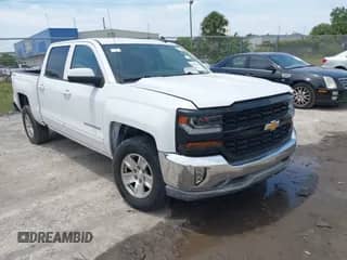 2018 Chevrolet Silverado 1500 LT z VIN 3GCUKREC5JG400460, wystawiony jako IAAI lot #42093254 z przebiegiem Nie podano mil oraz . Historia ofert i sprzedaży dostępna na DreamBid. Obrazek 1.