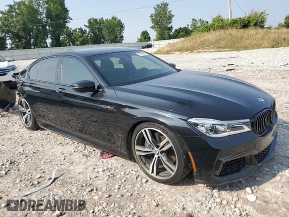 ✅ 2016 BMW 7 Series 750i xDrive • VIN: WBA7B0C59GGF92290 • Lot: 67015855. Wystawiony na Copart z przebiegiem 74 376 mil. Bezpłatny archiwum sprzedaży aukcyjnych z USA i szczegółowy raport historii pojazdu na DreamBid. Zdjęcie 4.