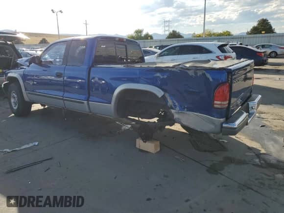 1997 Dodge Dakota z VIN 1B7GG23Y4VS270030, wystawiony jako Copart lot #73244994 z przebiegiem 87 277 mil mil oraz Szkoda całkowita • Salvage title. Historia ofert i sprzedaży dostępna na DreamBid. Obrazek 2.