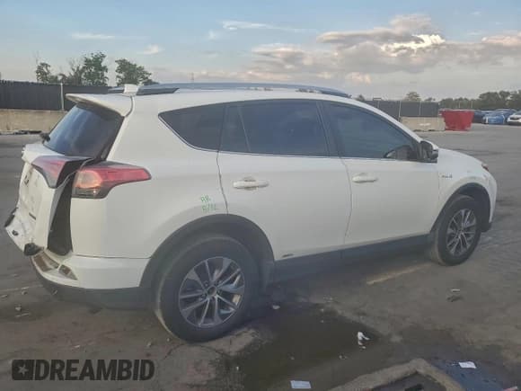 ✅ 2018 Toyota RAV4 Hybrid XLE • VIN: JTMRJREVXJD192048 • Lot: 93354285. Listed on Copart with 110,761 mi. Free auction sales archive from the USA and detailed vehicle history report at DreamBid. Image 3.