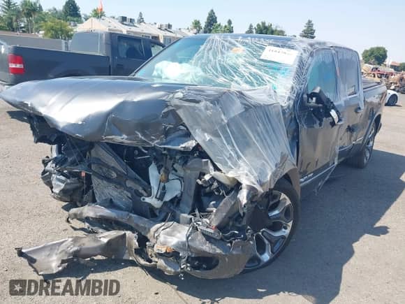 2020 Ram 1500 Limited z VIN 1C6SRFPT1LN419488, wystawiony jako IAAI lot #41847838 z przebiegiem 39 836 mil mil oraz . Historia ofert i sprzedaży dostępna na DreamBid. Obrazek 2.