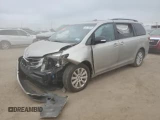 ✅ 2015 Toyota Sienna Limited • VIN: 5TDDK3DC4FS102487 • Lot: 66174025. Listed on Copart with 96,676 mi. Free auction sales archive from the USA and detailed vehicle history report at DreamBid. Image 1.