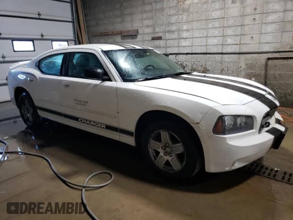 2007 Dodge Charger с VIN 2B3KA43G77H838233, выставлен на аукционе Copart как лот 74908684 с пробегом 151 428 миль миль и Списание • Salvage title. История ставок и продаж доступна на DreamBid. Изображение 4.