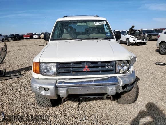 ✅ 1998 Mitsubishi Montero • VIN: JA4MR51R6WJ002639 • Lot: 82756475. Wystawiony na Copart z przebiegiem 234 948 mil. Bezpłatny archiwum sprzedaży aukcyjnych z USA i szczegółowy raport historii pojazdu na DreamBid. Zdjęcie 5.