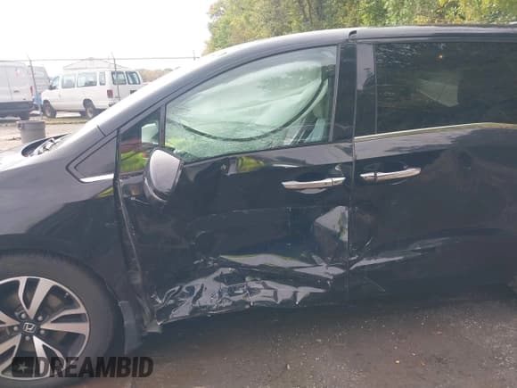 ✅ 2018 Honda Odyssey Elite • VIN: 5FNRL6H94JB026298 • Lot: 43446434. Listed on IAAI with 75,665 mi. Free auction sales archive from the USA and detailed vehicle history report at DreamBid. Image 6.