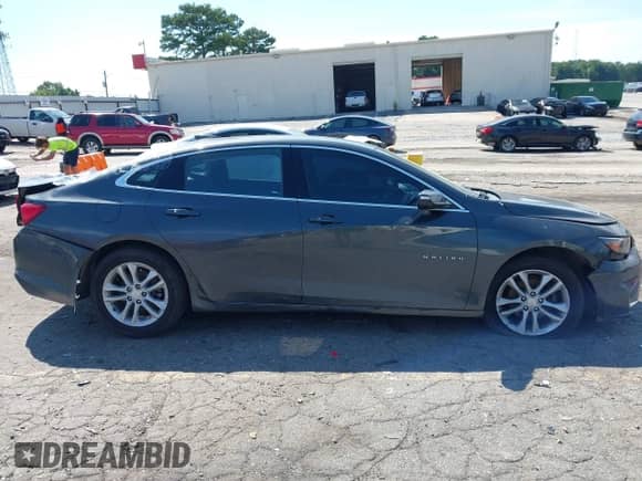 2018 Chevrolet Malibu LT z VIN 1G1ZD5ST2JF160114, wystawiony jako IAAI lot #43063782 z przebiegiem 117 178 mil mil oraz . Historia ofert i sprzedaży dostępna na DreamBid. Obrazek 13.