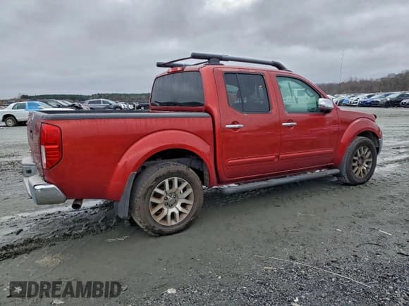 ✅ 2012 Nissan Frontier SV • VIN: 1N6AD0EV0CC411475 • Lot: 94964235. Listed on Copart with 202,923 mi. Free auction sales archive from the USA and detailed vehicle history report at DreamBid. Image 3.