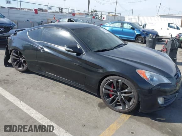 ✅ 2012 Hyundai Genesis Coupe Grand Touring • VIN: KMHHU6KH8CU068486 • Lot: 41686499. Wystawiony na IAAI z przebiegiem 104 579 mil. Bezpłatny archiwum sprzedaży aukcyjnych z USA i szczegółowy raport historii pojazdu na DreamBid. Zdjęcie 1.