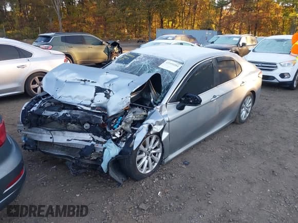 ✅ 2018 Toyota Camry LE • VIN: 4T1B11HK5JU678301 • Lot: 43509284. Listed on IAAI with 163,495 mi. Free auction sales archive from the USA and detailed vehicle history report at DreamBid. Image 2.