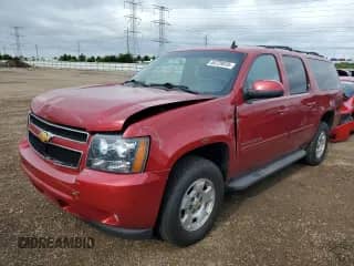 2013 Chevrolet Suburban LT with VIN 1GNSKJE7XDR322992, listed as a Copart auction lot 64729035 with 172,606 mi miles and Salvage title. Bid and sale history available at DreamBid. Image 1.