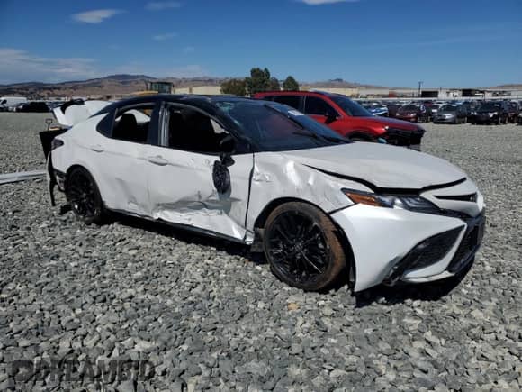 2022 Toyota Camry XSE с VIN 4T1K61BKXNU068345, выставлен на аукционе Copart как лот 65652475 с пробегом 101 142 миль миль и Списание • Salvage title. История ставок и продаж доступна на DreamBid. Изображение 4.