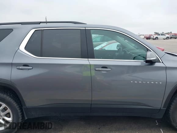 ✅ 2021 Chevrolet Traverse LT Cloth • VIN: 1GNERGKW8MJ210147 • Lot: 42424972. Listed on IAAI with 51,752 mi. Free auction sales archive from the USA and detailed vehicle history report at DreamBid. Image 13.