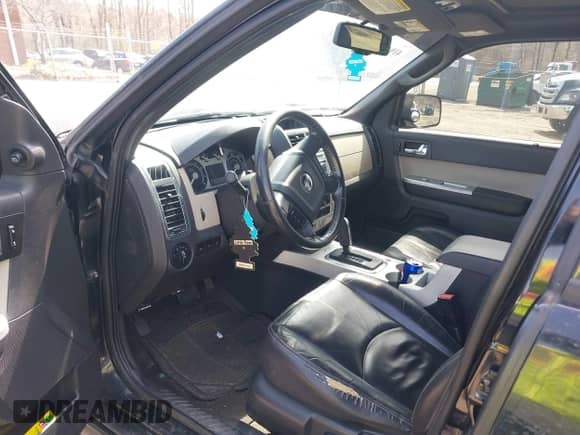 2009 Mercury Mariner Premier with VIN 4M2CU97799KJ04510, listed as a IAAI auction lot 41943965 with 190,929 mi miles and . Bid and sale history available at DreamBid. Image 5.