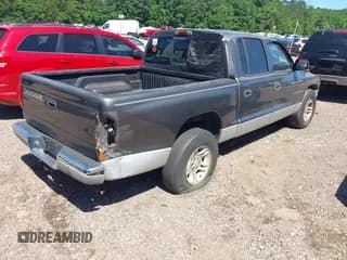 ✅ 2001 Dodge Dakota Sport • VIN: 1B7HL2ANX1S297770 • Lot: 42309715. Wystawiony na IAAI z przebiegiem 279 458 mil. Bezpłatny archiwum sprzedaży aukcyjnych z USA i szczegółowy raport historii pojazdu na DreamBid. Zdjęcie 4.