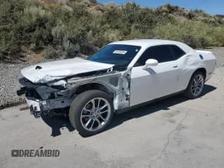 ✅ 2022 Dodge Challenger GT • VIN: 2C3CDZKG0NH223887 • Lot: 66398695. Listed on Copart with 51,590 mi. Free auction sales archive from the USA and detailed vehicle history report at DreamBid. Image 1.