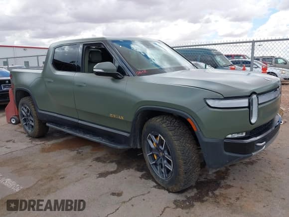 ✅ 2022 Rivian R1T Launch Edition • VIN: 7FCTGAAL8NN005099 • Лот: 42374412. Опубликован ранее на IAAI с пробегом Не указан. Бесплатный доступ к архиву аукционных продаж из США и подробный отчёт об истории автомобиля на DreamBid. Изображение 12.