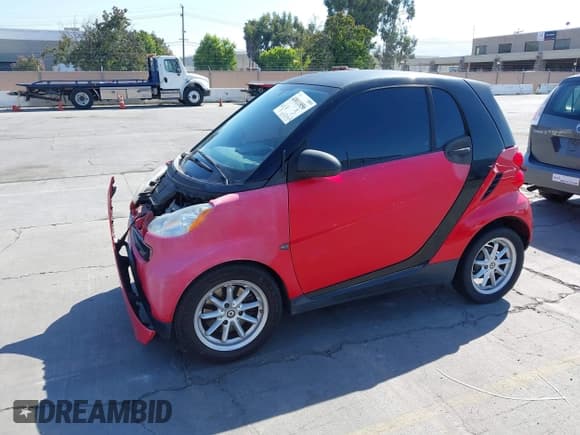 ✅ 2009 Smart fortwo Pure • VIN: WMEEJ31X29K251962 • Лот: 43011856. Опубликован ранее на IAAI с пробегом 92 154 миль. Бесплатный доступ к архиву аукционных продаж из США и подробный отчёт об истории автомобиля на DreamBid. Изображение 6.