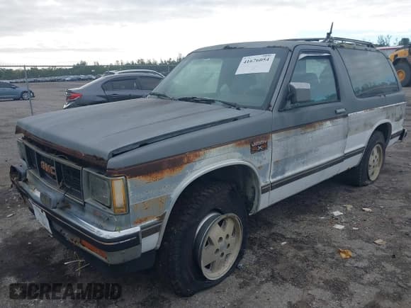 ✅ 1988 GMC Jimmy • VIN: 1GKCT18Z9J8540662 • Lot: 41676054. Wystawiony na IAAI z przebiegiem 211 439 mil. Bezpłatny archiwum sprzedaży aukcyjnych z USA i szczegółowy raport historii pojazdu na DreamBid. Zdjęcie 2.