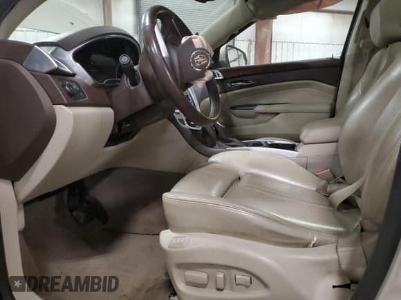 ✅ 2014 Cadillac SRX Performance Collection • VIN: 3GYFNFE37ES559315 • Lot: 89825135. Listed on Copart with 185,563 mi. Free auction sales archive from the USA and detailed vehicle history report at DreamBid. Image 7.