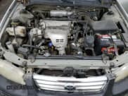 ✅ 2000 Toyota Camry LE • VIN: JT2BG22K5Y0482211 • Лот: 70771555. Опубликован ранее на Copart с пробегом 245 602 миль. Бесплатный доступ к архиву аукционных продаж из США и подробный отчёт об истории автомобиля на DreamBid. Изображение 11.