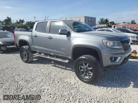 ✅ 2018 Chevrolet Colorado 4WD Z71 • VIN: 1GCGTDEN6J1288071 • Лот: 81923664. Опубликован ранее на Copart с пробегом 118 372 миль. Бесплатный доступ к архиву аукционных продаж из США и подробный отчёт об истории автомобиля на DreamBid. Изображение 4.