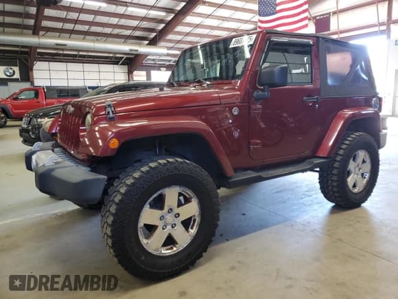 ✅ 2009 Jeep Wrangler Sahara • VIN: 1J8FA54119L760143 • Lot: 89688475. Listed on Copart with 137,576 mi. Free auction sales archive from the USA and detailed vehicle history report at DreamBid. Image 1.