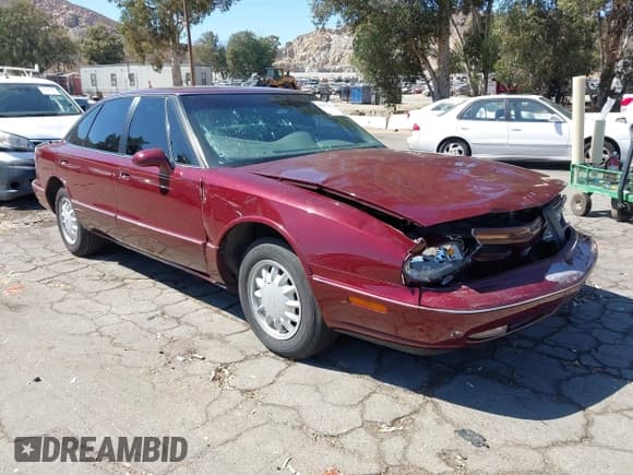 ✅ 1999 Oldsmobile 88 LS • VIN: 1G3HN52KXX4801618 • Lot: 42817668. Listed on IAAI with 65,115 mi. Free auction sales archive from the USA and detailed vehicle history report at DreamBid. Image 1.