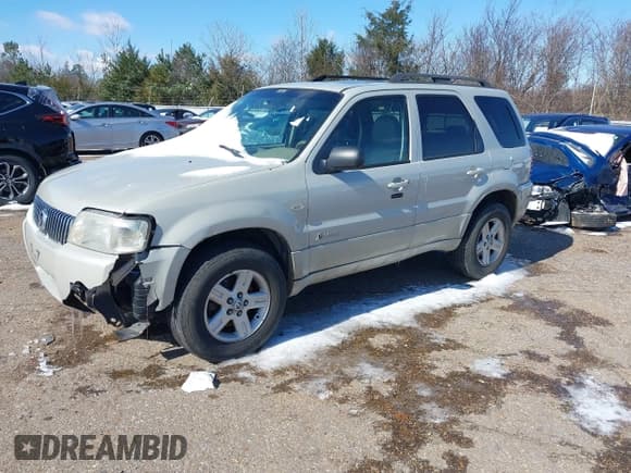 ✅ 2007 Mercury Mariner • VIN: 4M2CU39H07KJ20952 • Lot: 41502938. Wystawiony na IAAI z przebiegiem 148 622 mil. Bezpłatny archiwum sprzedaży aukcyjnych z USA i szczegółowy raport historii pojazdu na DreamBid. Zdjęcie 2.