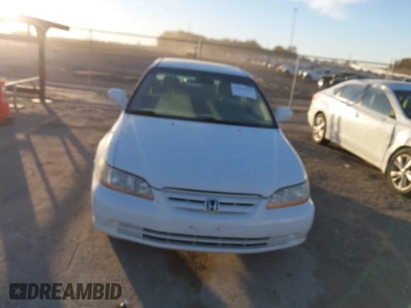 ✅ 2002 Honda Accord LX • VIN: 1HGCG16462A074045 • Lot: 43644442. Listed on IAAI with 145,966 mi. Free auction sales archive from the USA and detailed vehicle history report at DreamBid. Image 6.
