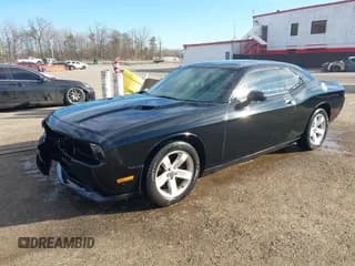 ✅ 2013 Dodge Challenger SXT • VIN: 2C3CDYAG5DH591010 • Lot: 41649468. Wystawiony na IAAI z przebiegiem 159 327 mil. Bezpłatny archiwum sprzedaży aukcyjnych z USA i szczegółowy raport historii pojazdu na DreamBid. Zdjęcie 2.