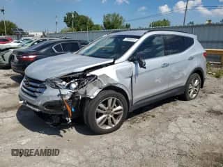 2014 Hyundai Santa Fe с VIN 5XYZU3LAXEG206428, выставлен на аукционе Copart как лот 71009555 с пробегом 56 183 миль миль и На запчасти • Non repairable. История ставок и продаж доступна на DreamBid. Изображение 1.