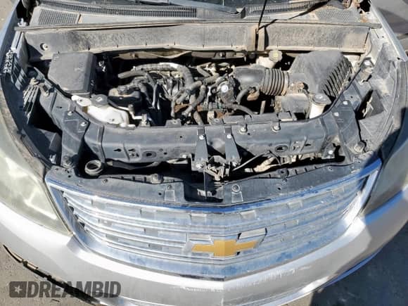 2014 Chevrolet Traverse LS z VIN 1GNKRFED4EJ119322, wystawiony jako Copart lot #85428215 z przebiegiem 122 646 mil mil oraz Czysty tytuł • Clean title. Historia ofert i sprzedaży dostępna na DreamBid. Obrazek 12.