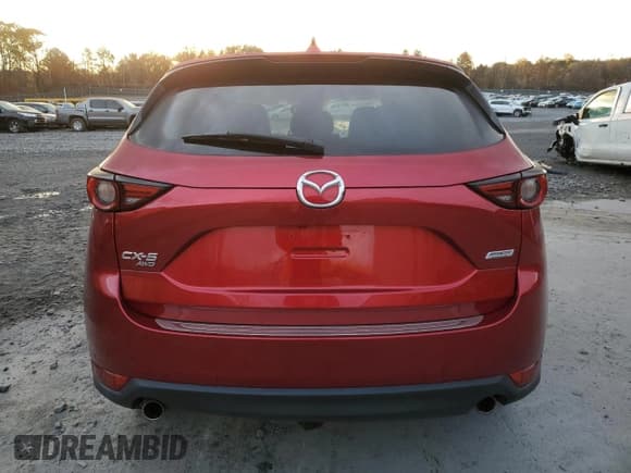 ✅ 2019 Mazda CX-5 Grand Touring • VIN: JM3KFBDM1K1569606 • Лот: 90866455. Опубликован ранее на Copart с пробегом 97 882 миль. Бесплатный доступ к архиву аукционных продаж из США и подробный отчёт об истории автомобиля на DreamBid. Изображение 6.