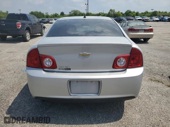 ✅ 2010 Chevrolet Malibu 1LS • VIN: 1G1ZB5EB6AF273458 • Lot: 69045635. Listed on Copart with 132,732 mi. Free auction sales archive from the USA and detailed vehicle history report at DreamBid. Image 6.