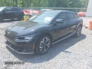 ✅ 2024 Kia EV6 Wind • VIN: KNDC3DLC2R5217910 • Лот: 42309547. Опубликован ранее на IAAI с пробегом 14 501 миль. Бесплатный доступ к архиву аукционных продаж из США и подробный отчёт об истории автомобиля на DreamBid. Изображение 20.