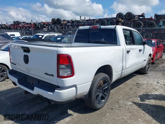 ✅ 2023 Ram 1500 Lone Star • VIN: 1C6SRFMT5PN599519 • Lot: 42921193. Listed on IAAI with 153,168 mi. Free auction sales archive from the USA and detailed vehicle history report at DreamBid. Image 4.